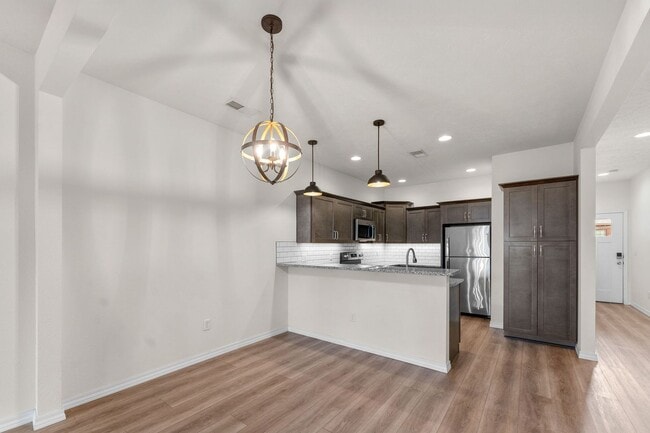 Building Photo - NEW LUXURY 2 BED 2 BATH 1 CAR GARAGE DUPLEX