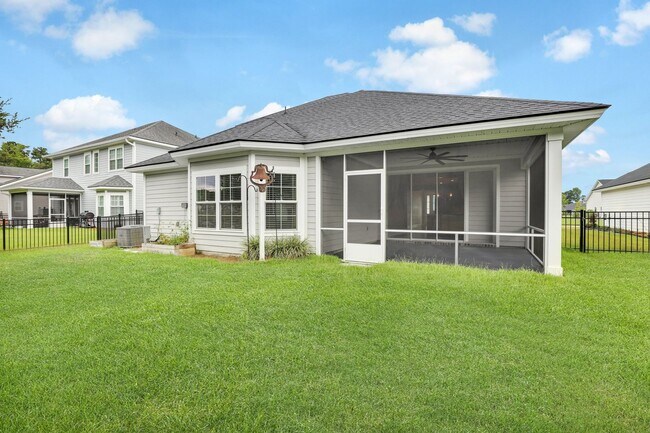 Building Photo - Spacious 4BR/3BA Pooler Home – Lagoon Views, Prime Location