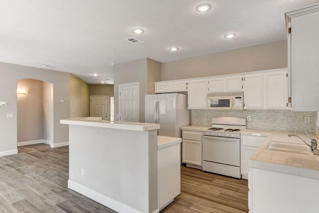 Building Photo - 1 Story in Summerlin - Fresh Carpet, Paint, and Luxury Plank!