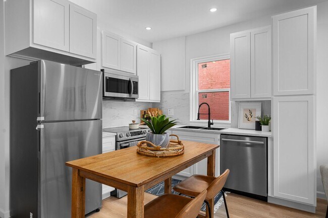 Building Photo - $1795 - Single Family Home with Private Two-Level Living Spaces, Driveway Parking & Modern Updates