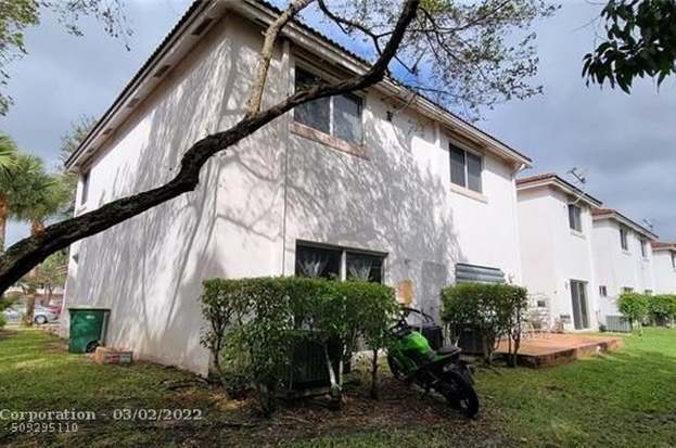 Building Photo - 7661 Tamarac Island Cir