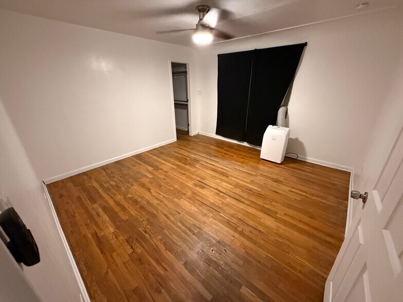 Master bedroom includes AC unit until I get central cooling installed - 1035 S Quitman St
