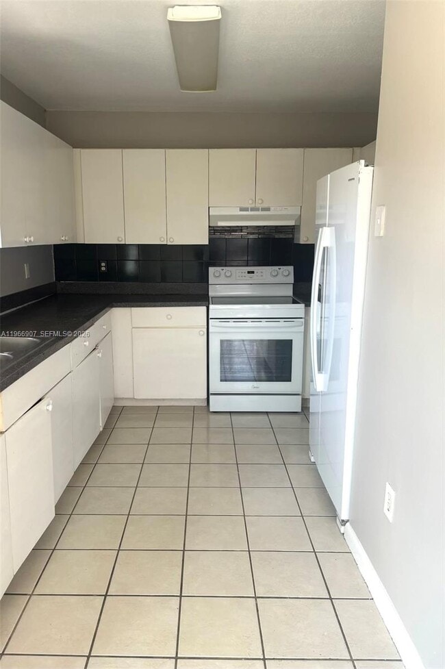 Building Photo - 1205 NW 7th Ave