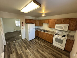 Building Photo - Clean, quiet, and affordable. 2/1 with a d...