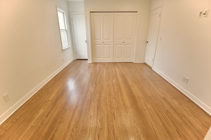 Primary Bedroom with Ensuite, oversized space with 3 Closets and HDMI wall connections - 4755 Wiota St