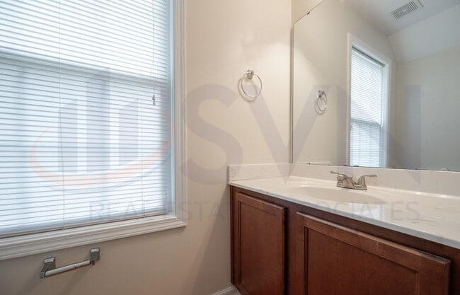 Building Photo - Welcome to this spacious 4-bedroom, 2.5-ba...