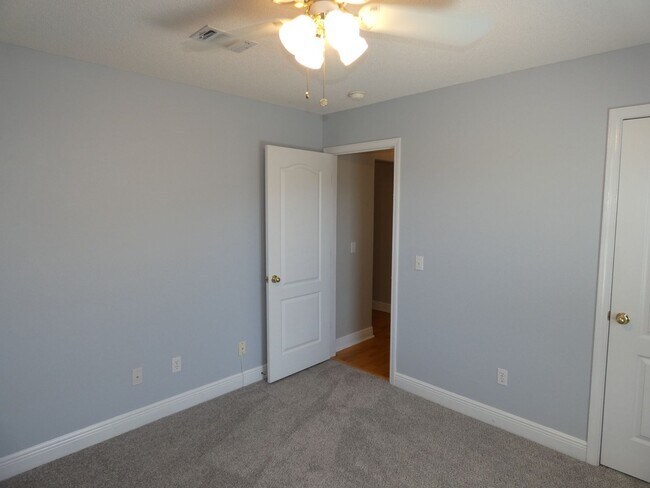 Building Photo - Charming 4-Bedroom Home With Sunroom