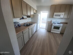 Building Photo - 3142 N 24th Dr