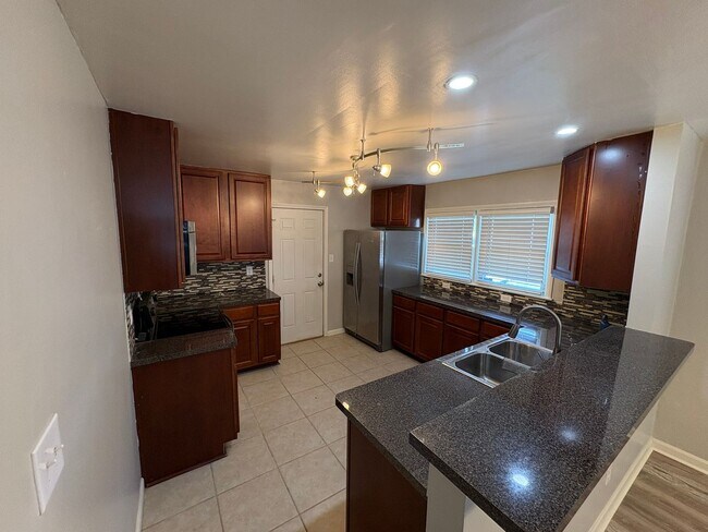 Building Photo - Beautiful updated home with new flooring and fresh paint