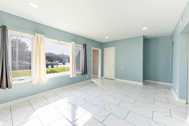 Building Photo - 7740 S Laramie Ave