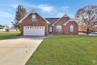 Building Photo - Pet Friendly Three Bedroom with Bonus!