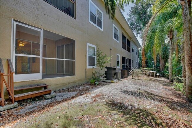 Building Photo - Spacious 3/2 Condo with a Cover Patio Area in the Desirable Palm Villas - Kissimmee!