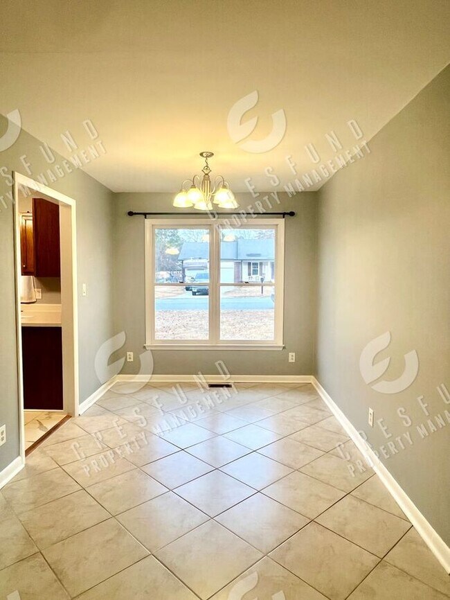 Building Photo - RENT JUST REDUCED!!! Exceptional value for a 3 Bedroom 2bath Fenced yard home close to Ft. Bragg