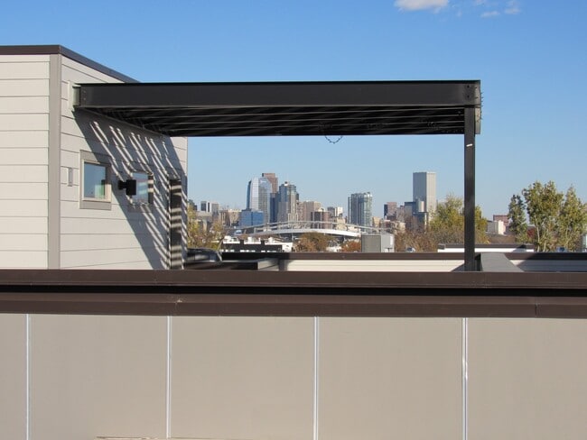 Building Photo - Town home a Block away from Sloan's Lake with roof top Deck