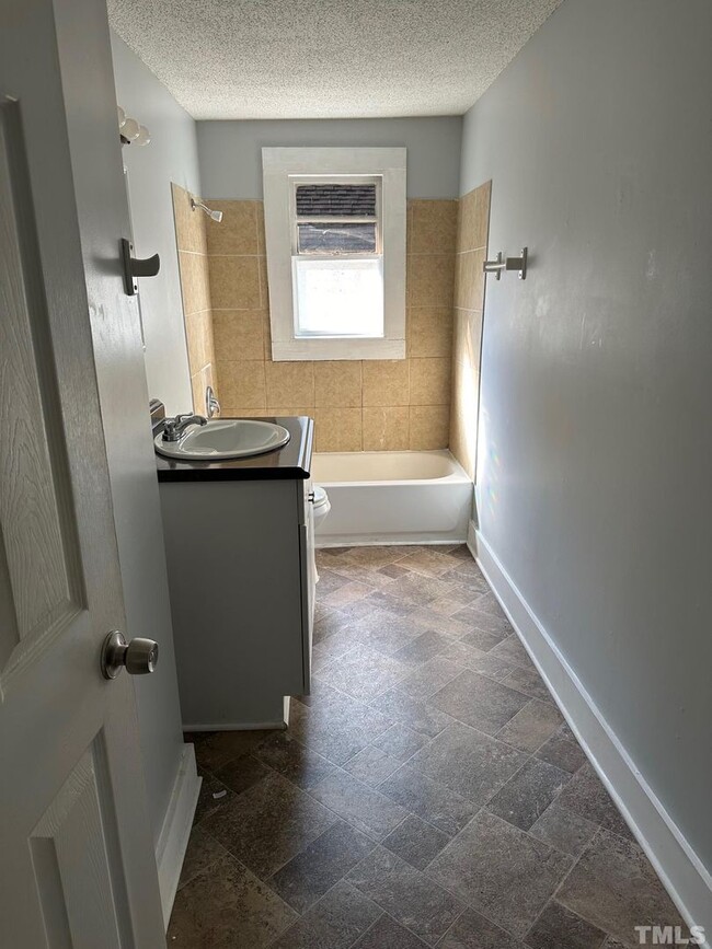 Building Photo - Your Own Home and Yard Centrally Located 3...