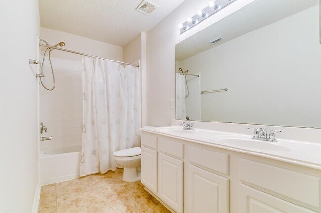 Building Photo - 8310 Coriander Ln