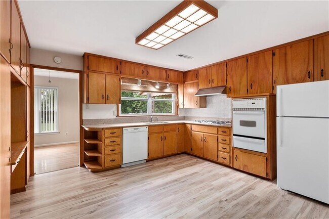 Building Photo - 1201 N Woolsey Ave