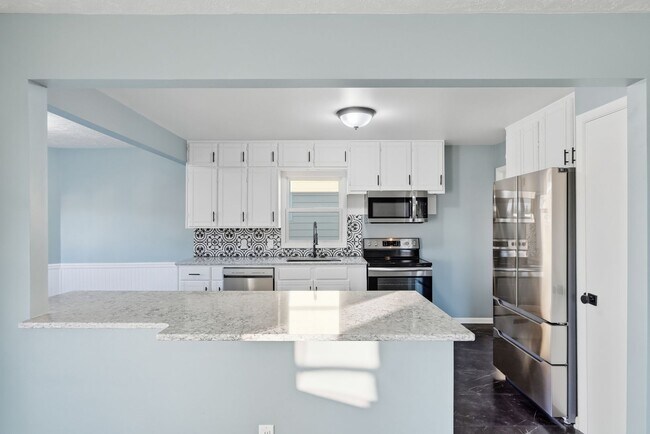 Building Photo - Fully remodeled 4 bed charmer