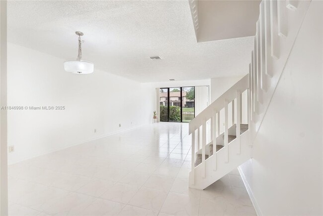 Building Photo - 3952 Cocoplum Cir