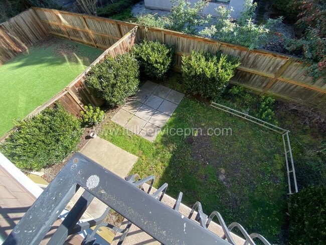 Building Photo - Spacious townhome with private backyard, garage parking, multiple decks, and a dedicated home off...
