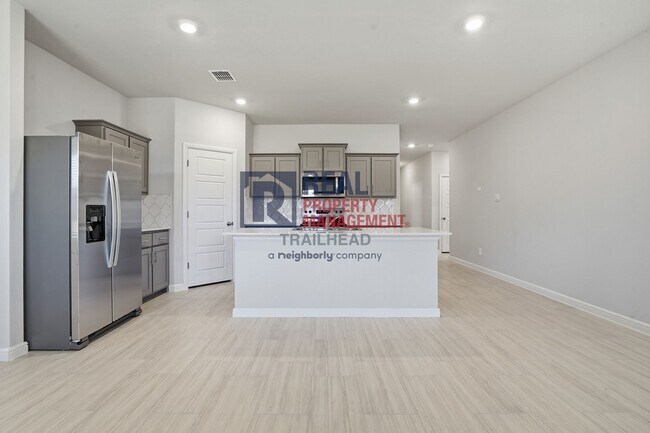 Building Photo - Inviting 4-Bedroom Layout with Flexible Living Areas