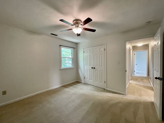Building Photo - Available NOW! A 4-6 Bedroom Home! Attache...