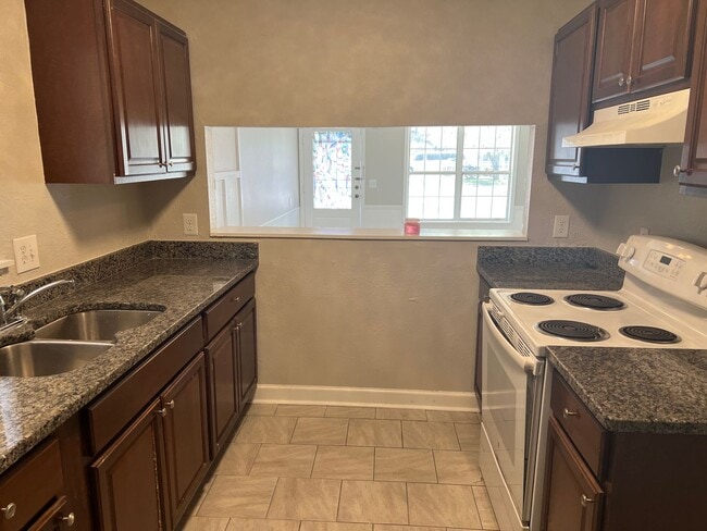 Building Photo - Available Now! Two-bedroom Duplex in Socas...