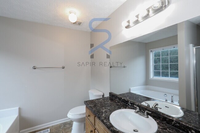 Building Photo - LIMITED-TIME OFFER!  Apply today with NO APPLICATION FEE! Terms apply. Call (678) 487-7896, Optio...