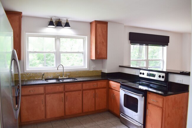 Building Photo - 1610 E 27th Ave