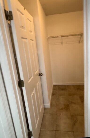 master walk in closet - 1208 Apex Ln