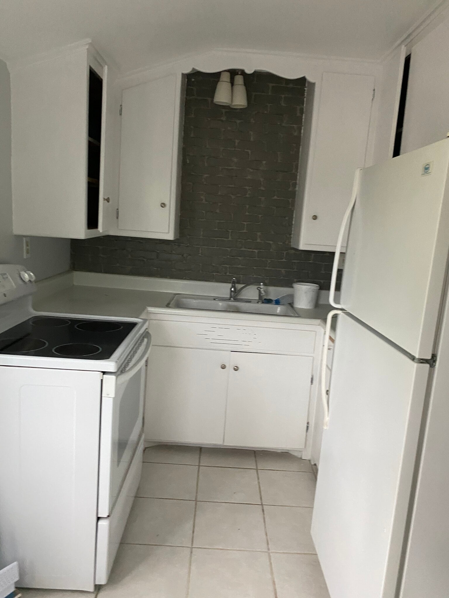 Kitchen including new appliances. - 2451 N 114th St