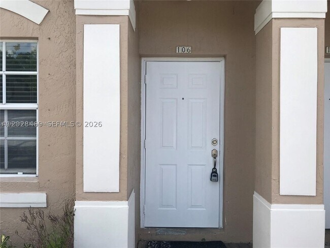 Building Photo - 5743 NW 114th 106