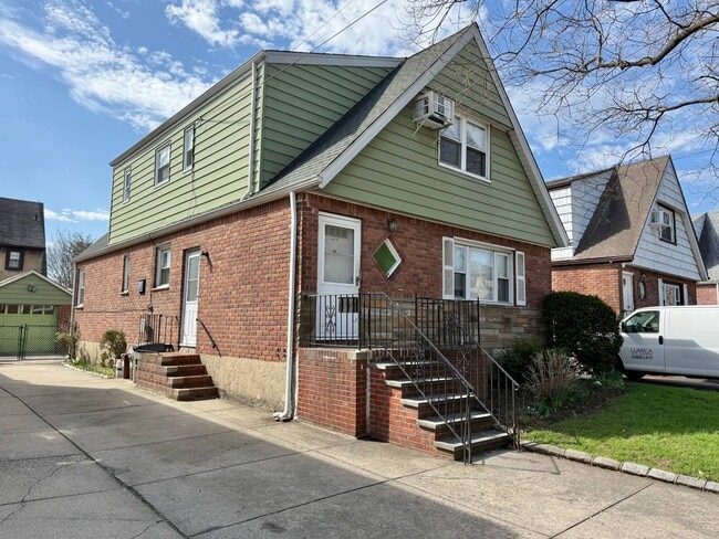 Building Photo - 203-16-203-42 42nd Ave