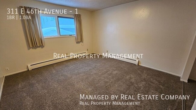 Building Photo - 311 E 46th Ave