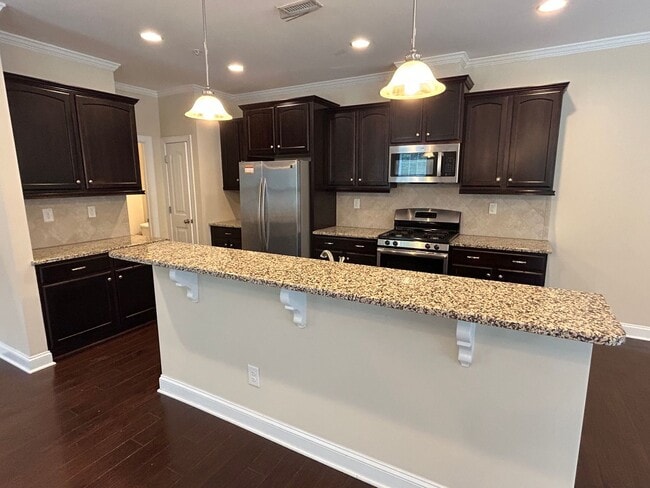 Building Photo - End Unit 3 Bed | 2.5 Bath Townhouse in Cha...