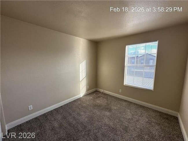 Building Photo - Bright Northwest Second-Floor Condo with Oversized Balcony & Community Pool!