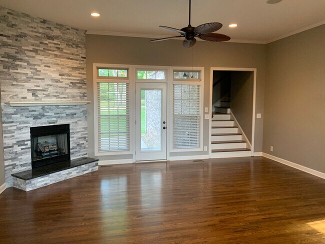 Building Photo - Luxury Living! Beautiful Brick Home in Sango with 3 car garage.