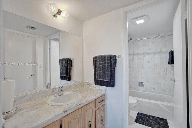 Building Photo - 10777 W Sample Rd