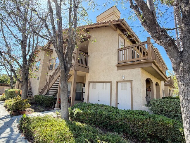 Building Photo - BEAUTIFULLY REFRESHED UPPER-LEVEL CONDO WITH GARAGE & RESORT-STYLE AMENITIES