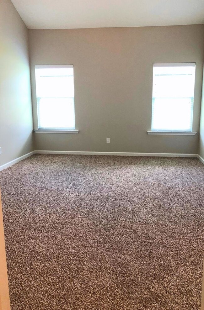 Building Photo - 3/2 with landscaping included!