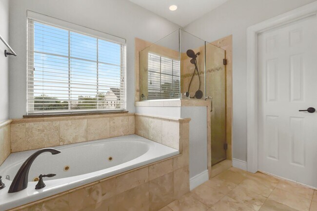 Building Photo - Light-Filled Corner Home with Rooftop Pati...