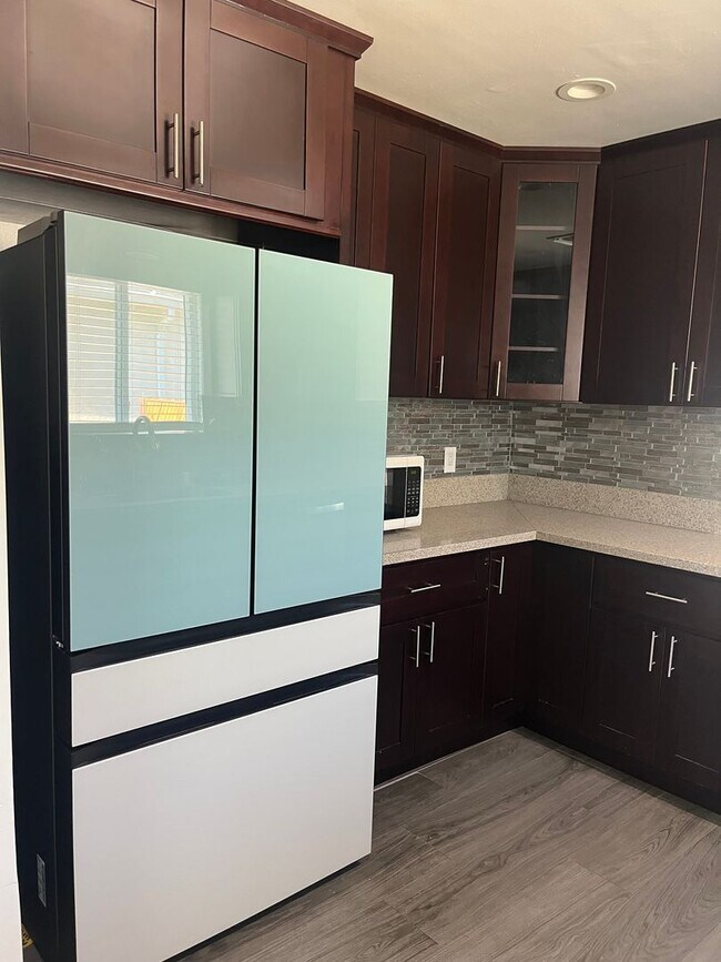 Building Photo - Home with a Cabin Style Family room and backyard Oasis