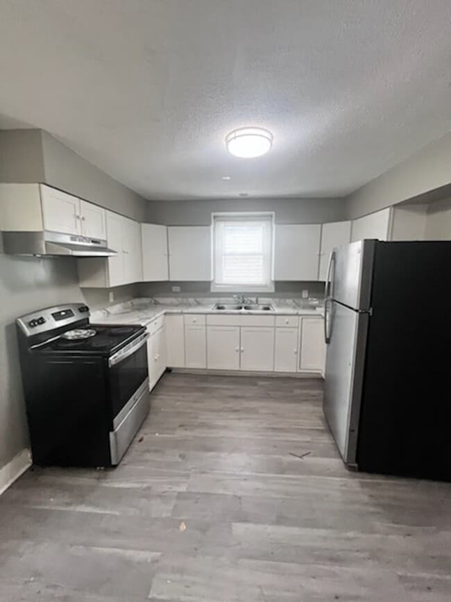 Building Photo - Cozy 2BR/1Ba house with garage