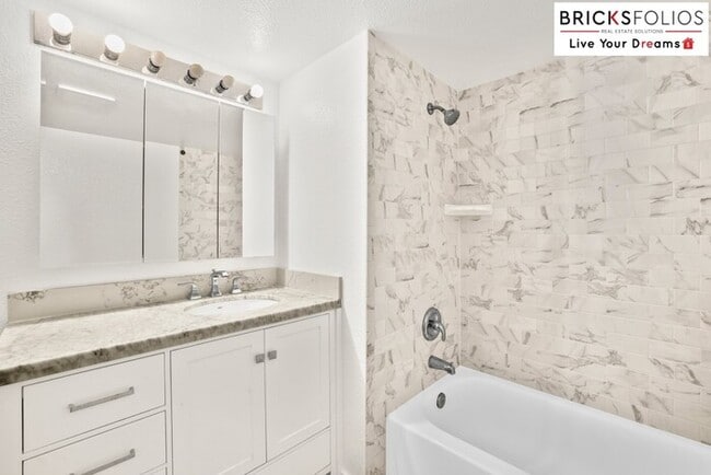 Building Photo - Live Steps from Microsoft | Stylish 2BR Condo with Fireplace & Parking