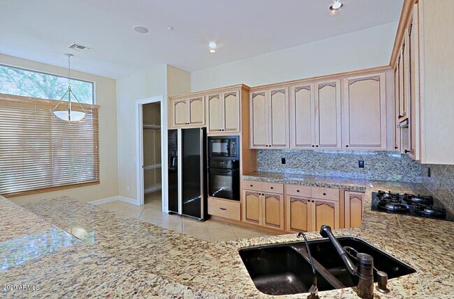 Building Photo - 9311 E Cavalry Dr