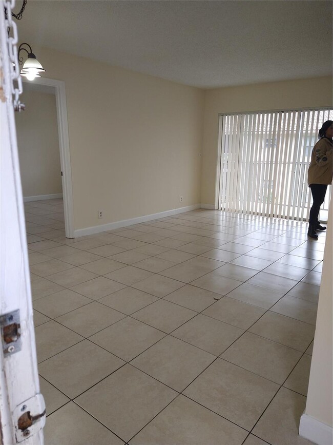 Building Photo - 8395 Royal Palm Blvd