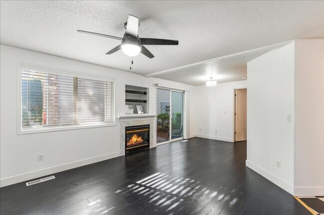Building Photo - Versatile 4-Bedroom Corner Condo with Main...