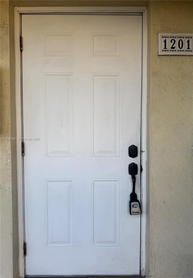 Building Photo - 10101 W Okeechobee Rd