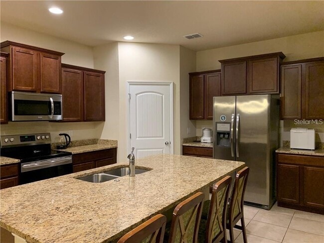 Building Photo - 16348 Brisk Breeze Aly