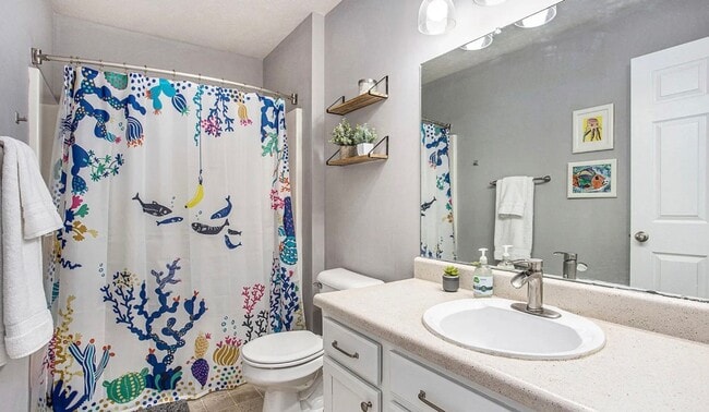 Building Photo - Charming 3-Bedroom End Unit Condo – Prime ...